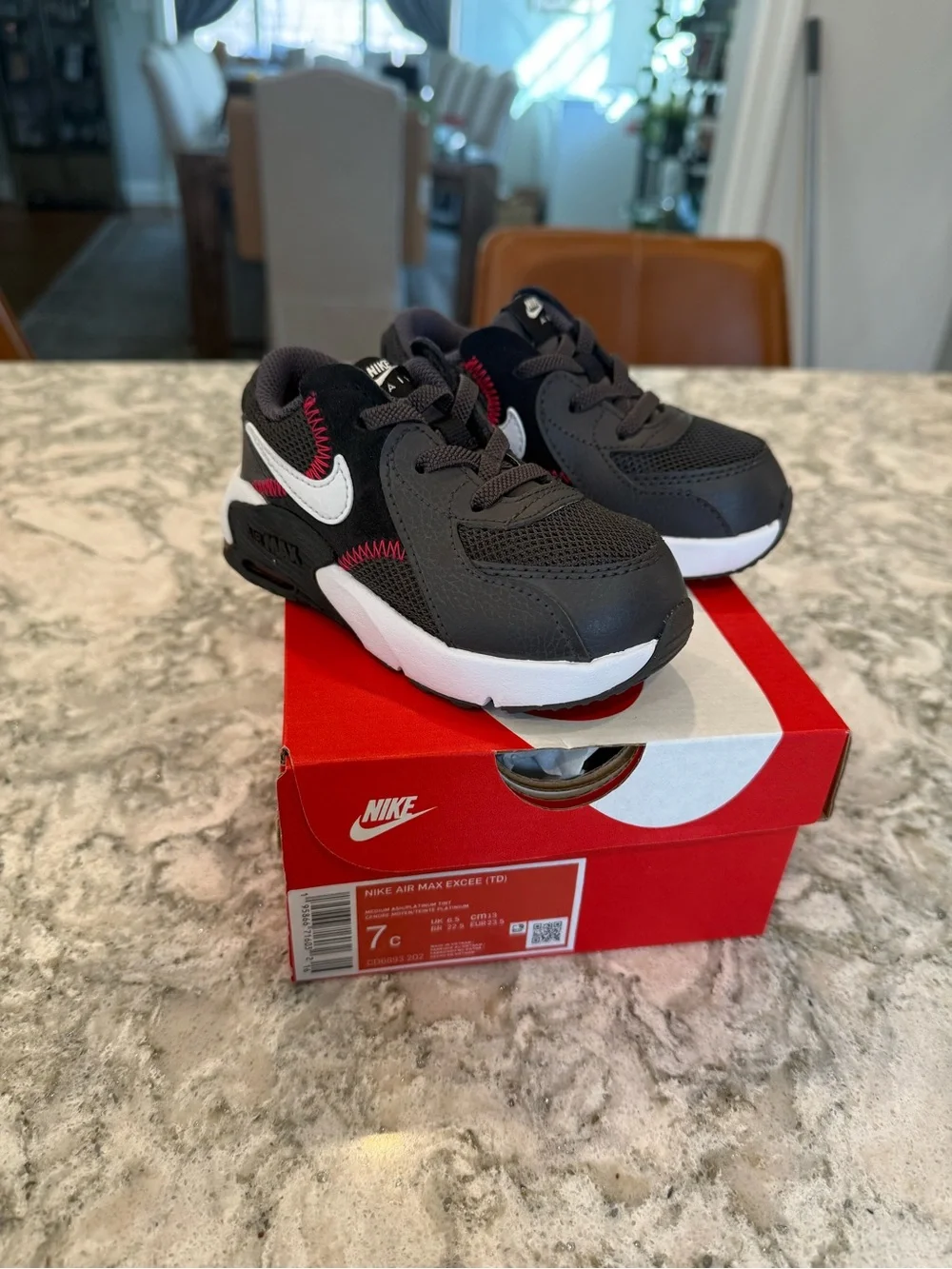 Nike Kids Black/White Sneakers with Red Stitch Accents
